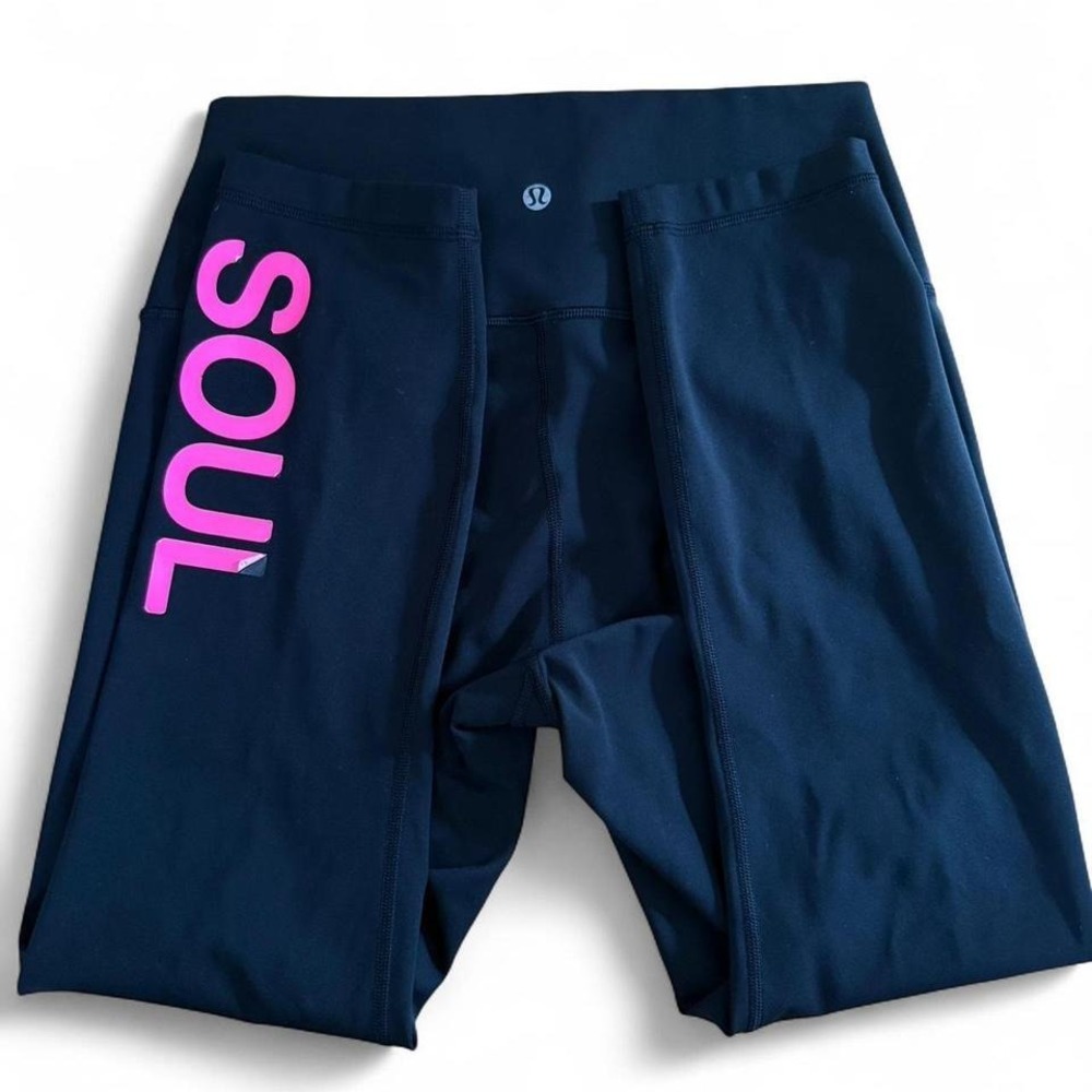 Black and pink Lululemon‎ Soul Cycle leggings